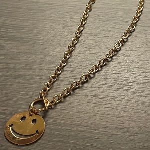 Gold smiley face necklace!